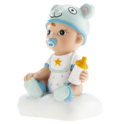 Kakkukoriste poikavauva hatulla ja tuttipullolla